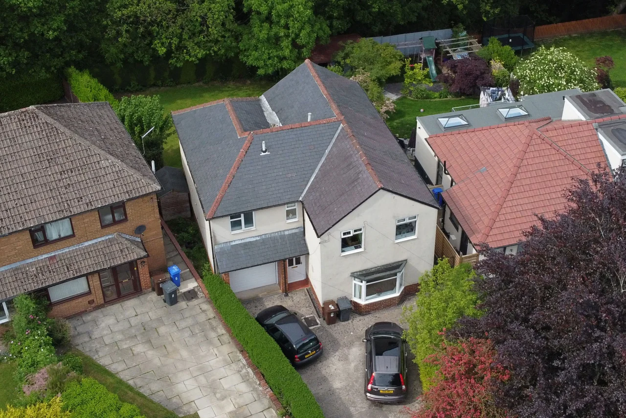 Aerial photograph of a detached property and its surroundings